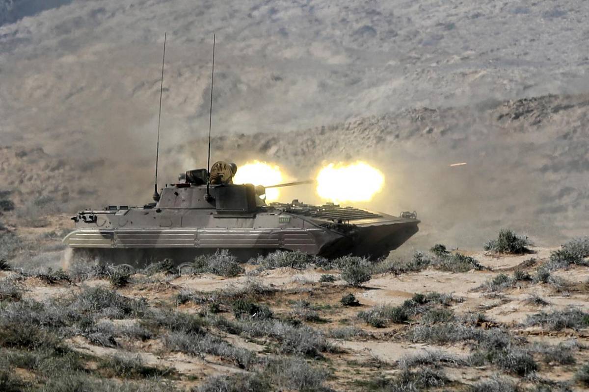 War An armoured fighting vehicles opens fire on their enemy